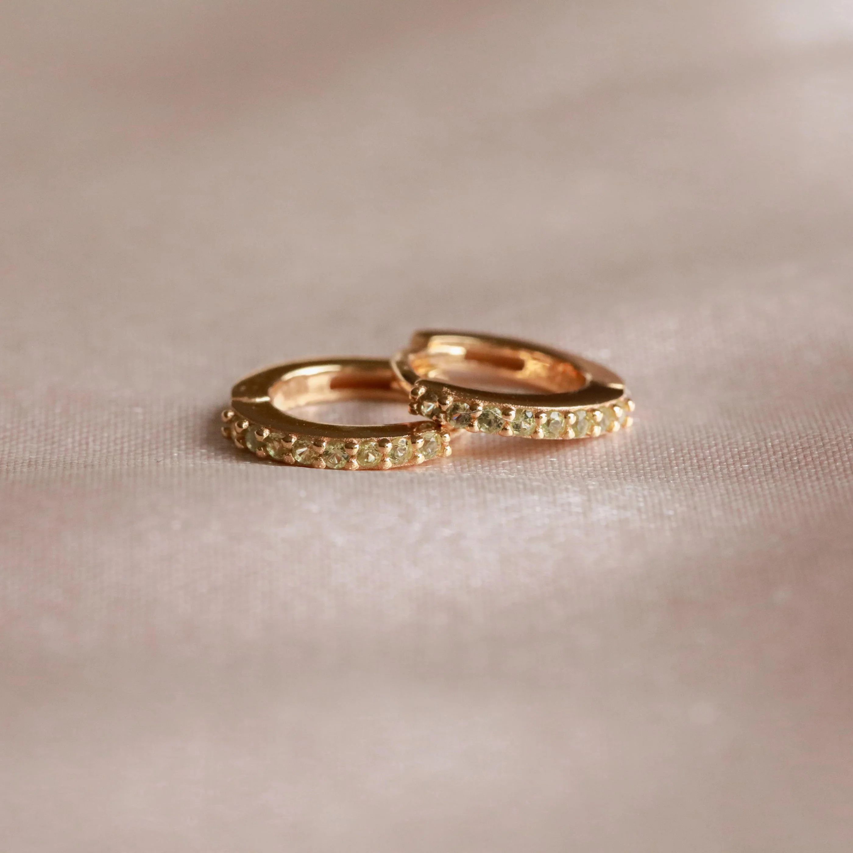 August Birthstone Huggies in Gold with Peridot CZ - Image 3