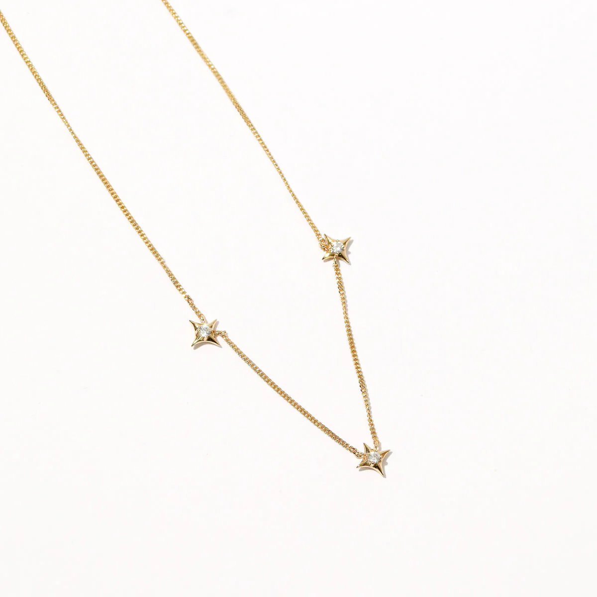 Cosmic Star Charm Necklace in Gold - Image 3