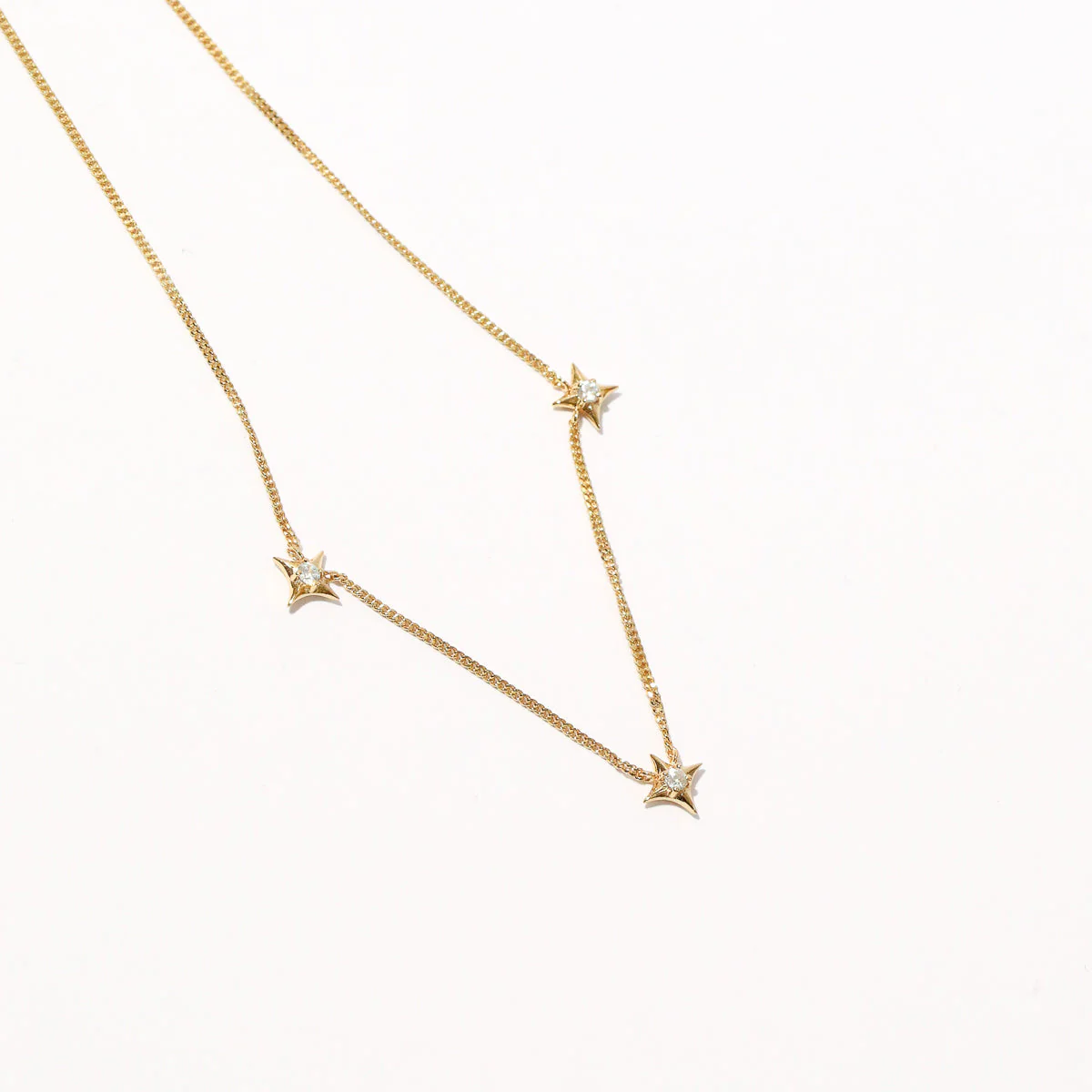 Cosmic Star Charm Necklace in Gold - Image 7