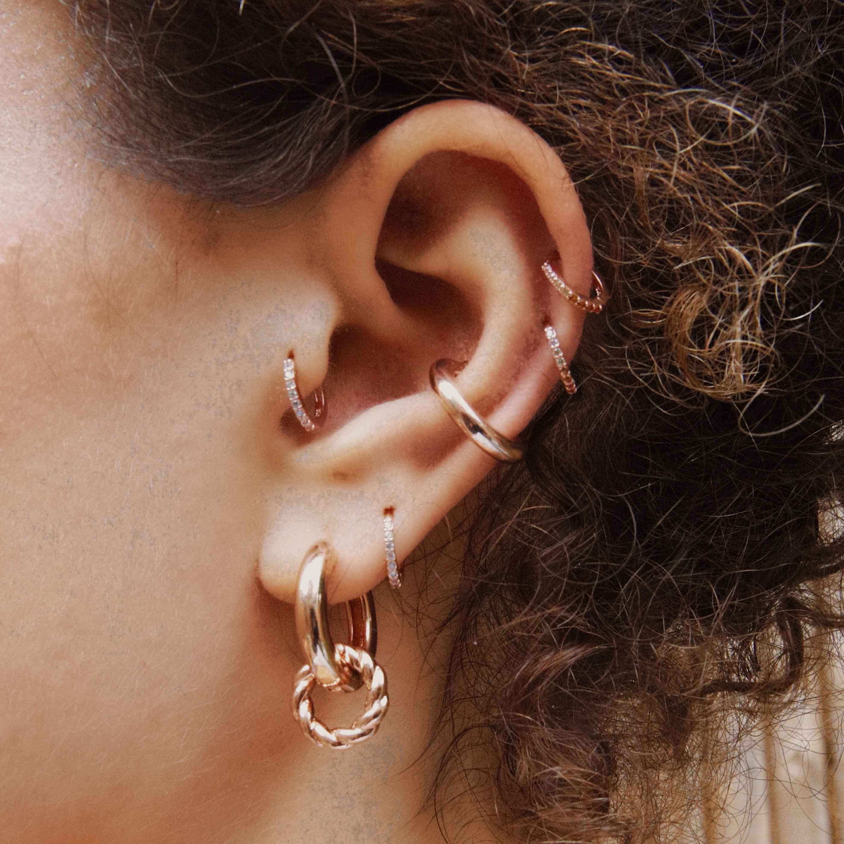 April Birthstone Huggies in Rose Gold with Clear CZ - Image 3