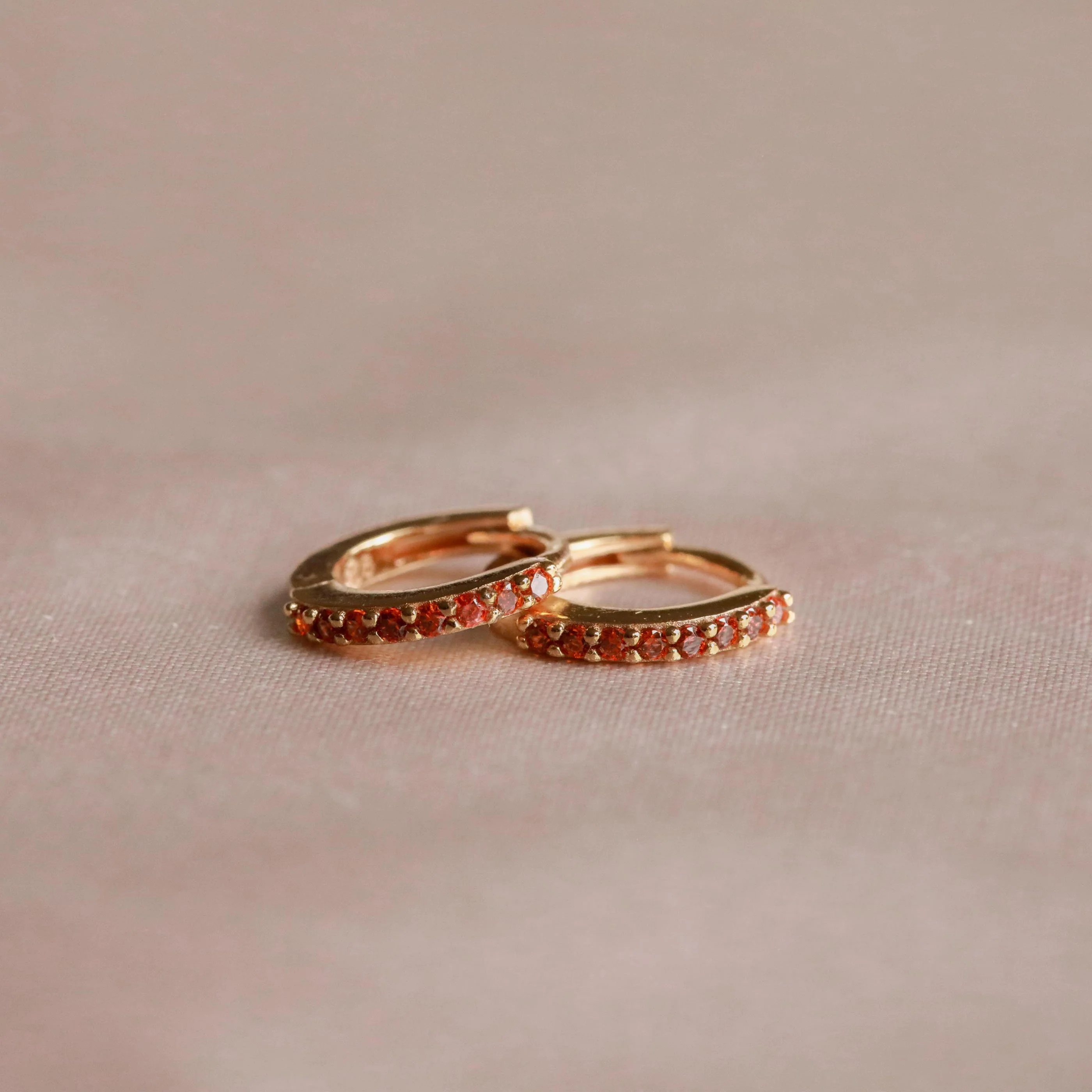 January Birthstone Huggies in Gold with Garnet CZ - Image 3