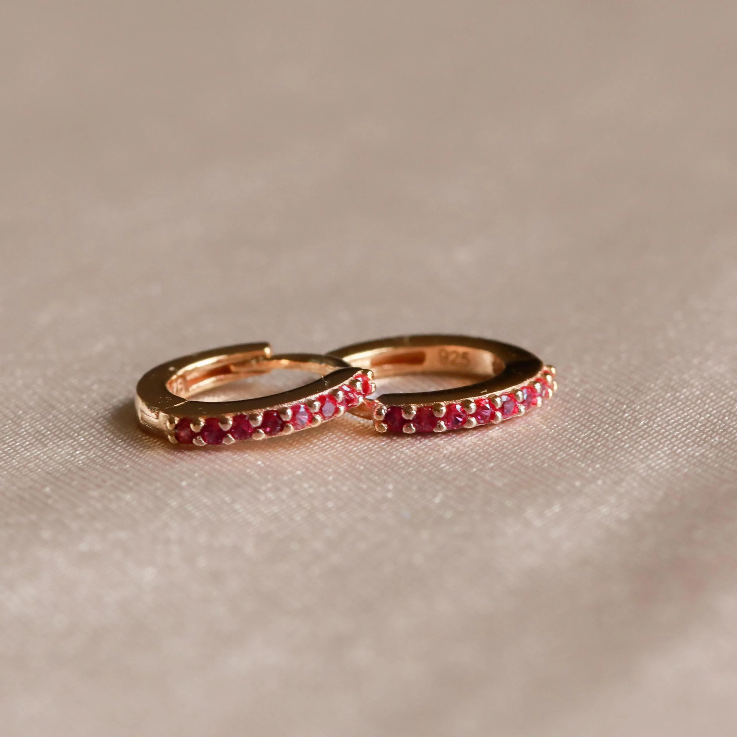 July Birthstone Huggies in Gold with Ruby CZ - Image 3