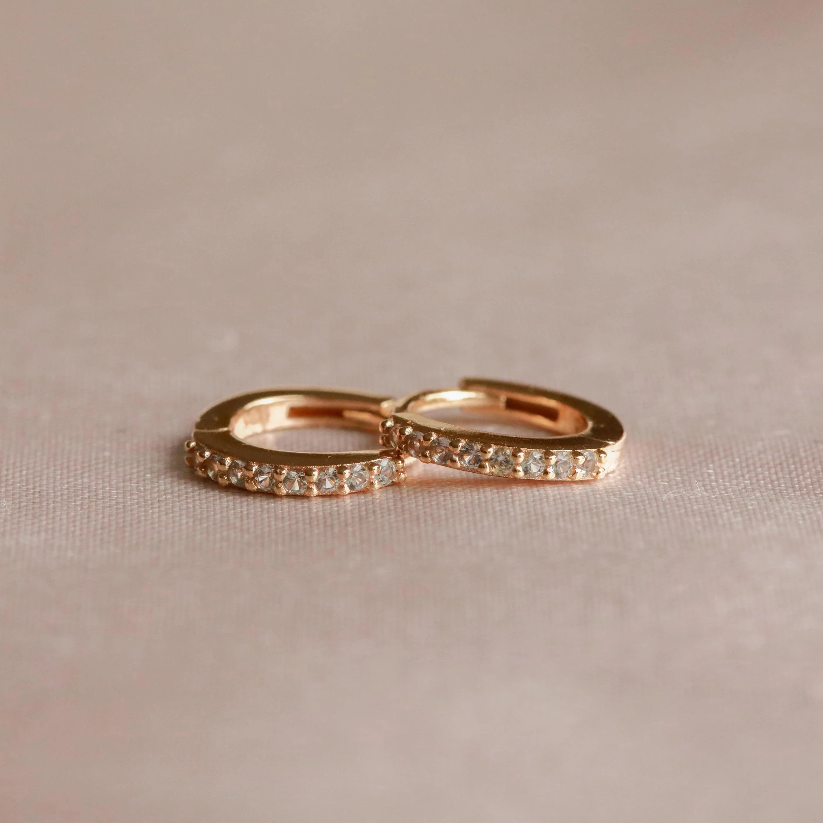 March Birthstone Huggies in Gold with Aquamarine CZ - Image 3