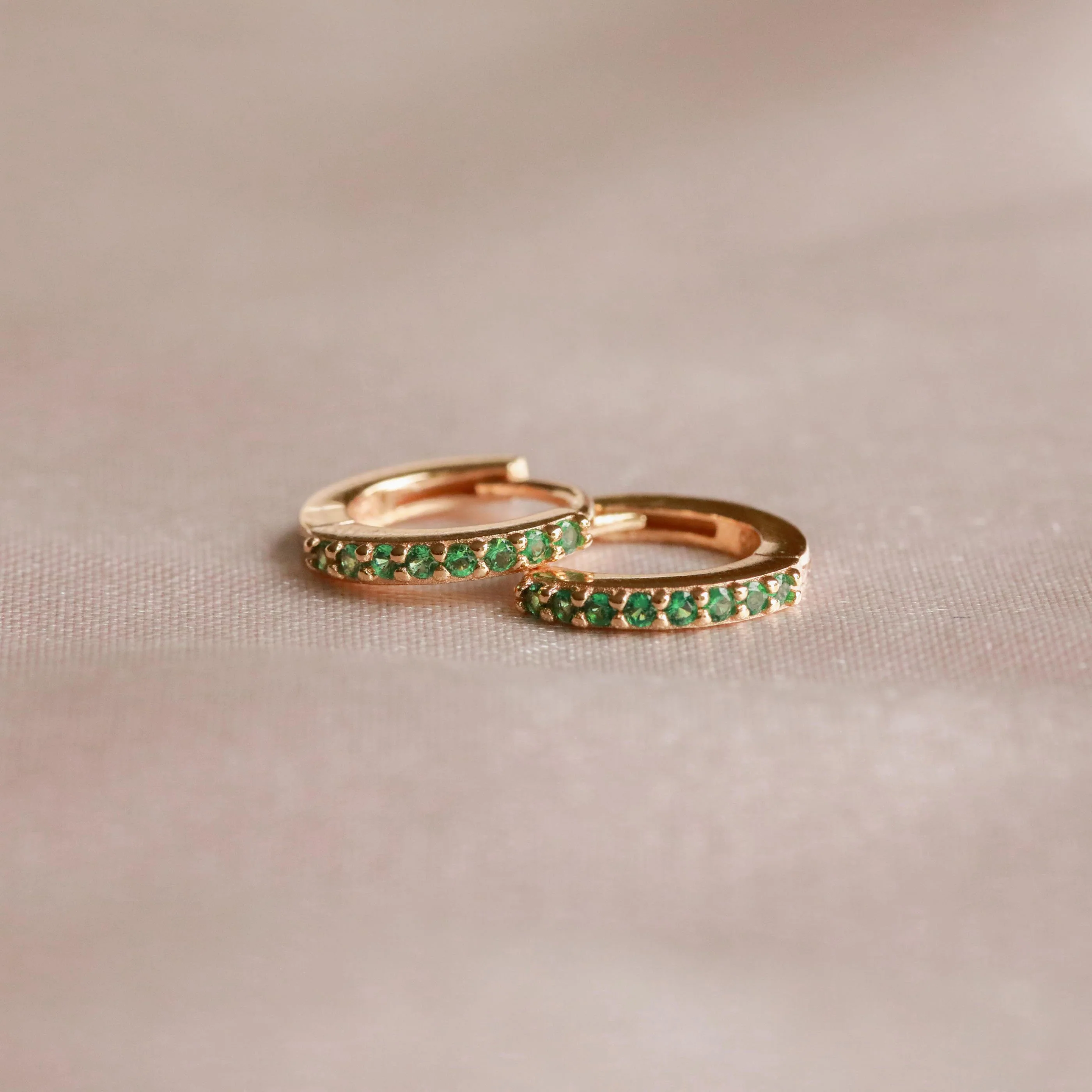 May Birthstone Huggies in Gold with Emerald CZ - Image 3